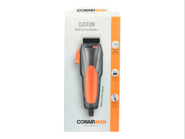 Juego de peluquería Conair Man en colores negro y naranja con diseño ergonómico.