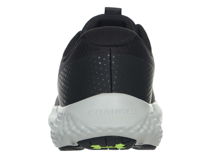 Tenis deportivos Under Armour Charged Rogue 3 Storm en color negro con suela blanca.