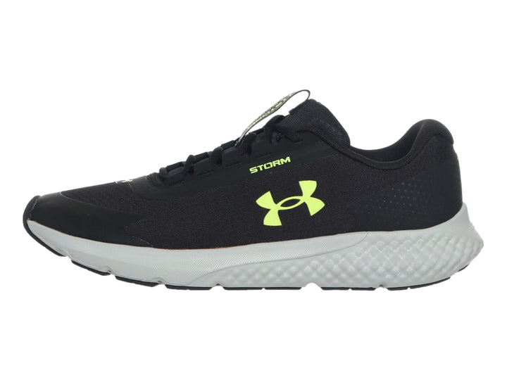 Tenis deportivos Under Armour Charged Rogue 3 Storm en color negro con suela blanca.