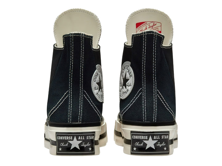 Tenis Converse Chuck Taylor All Star 70 Hi Plus color negro con suela blanca y franjas negras.