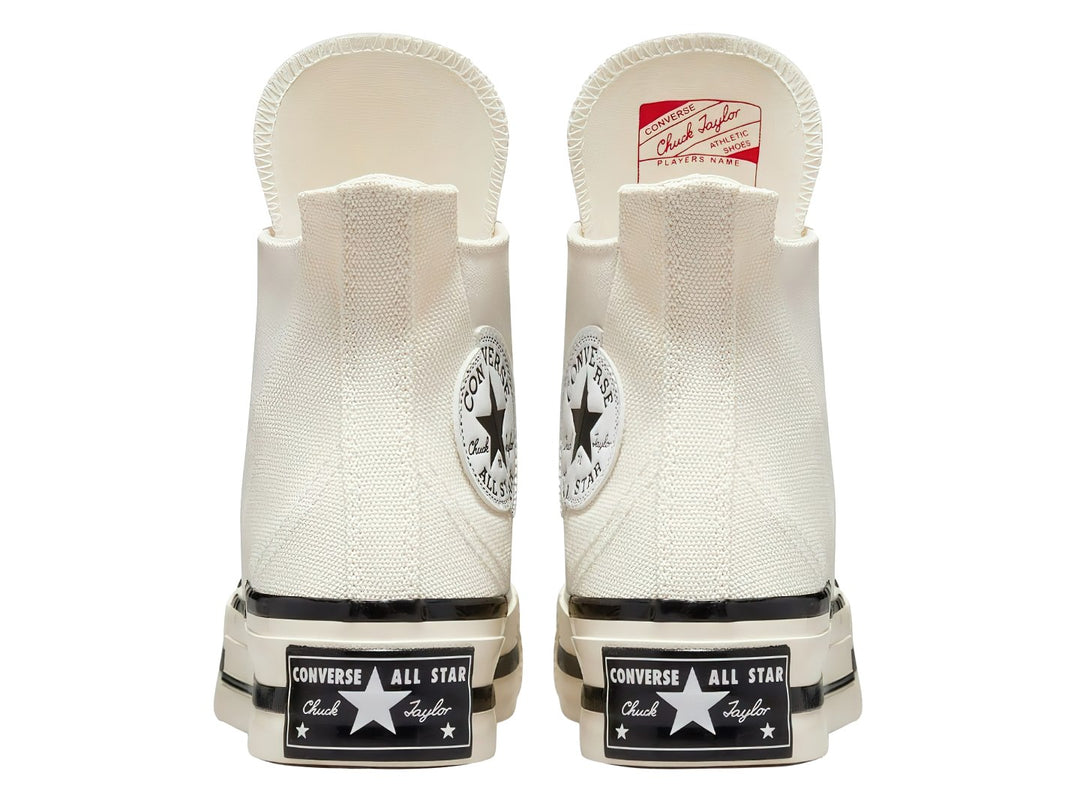Tenis Converse Chuck Taylor All Star 70 HI Plus color blanco hueso con suela de plataforma y detalles en negro.