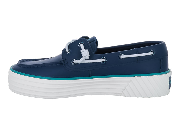 Zapato náutico Sperry de cuero azul marino con suela de plataforma blanca y detalle en turquesa.
