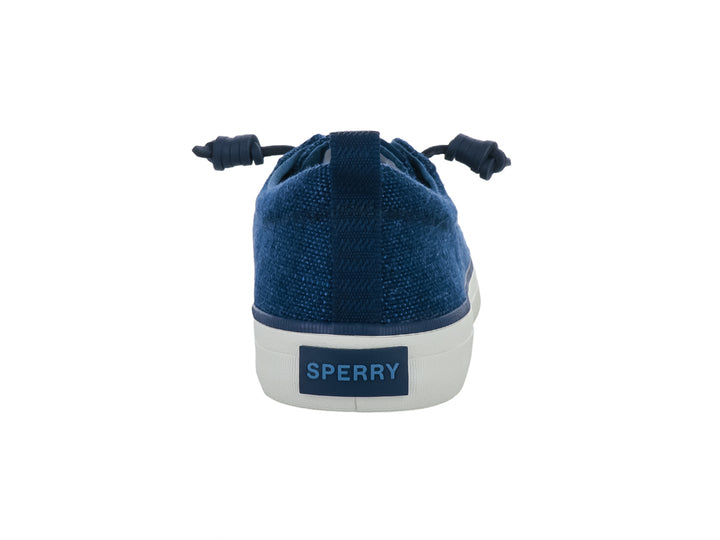 Tenis casuales Sperry de color azul con suela blanca y cordones azules.