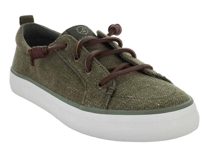 Zapato Sperry modelo Crest Vibe en color oliva con suela blanca y cordones marrones elásticos.