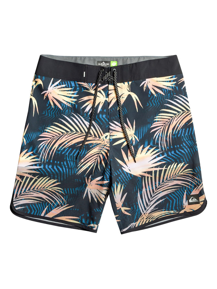 Traje de baño Quiksilver negro con estampado de hojas tropicales en tonos azul y amarillo.