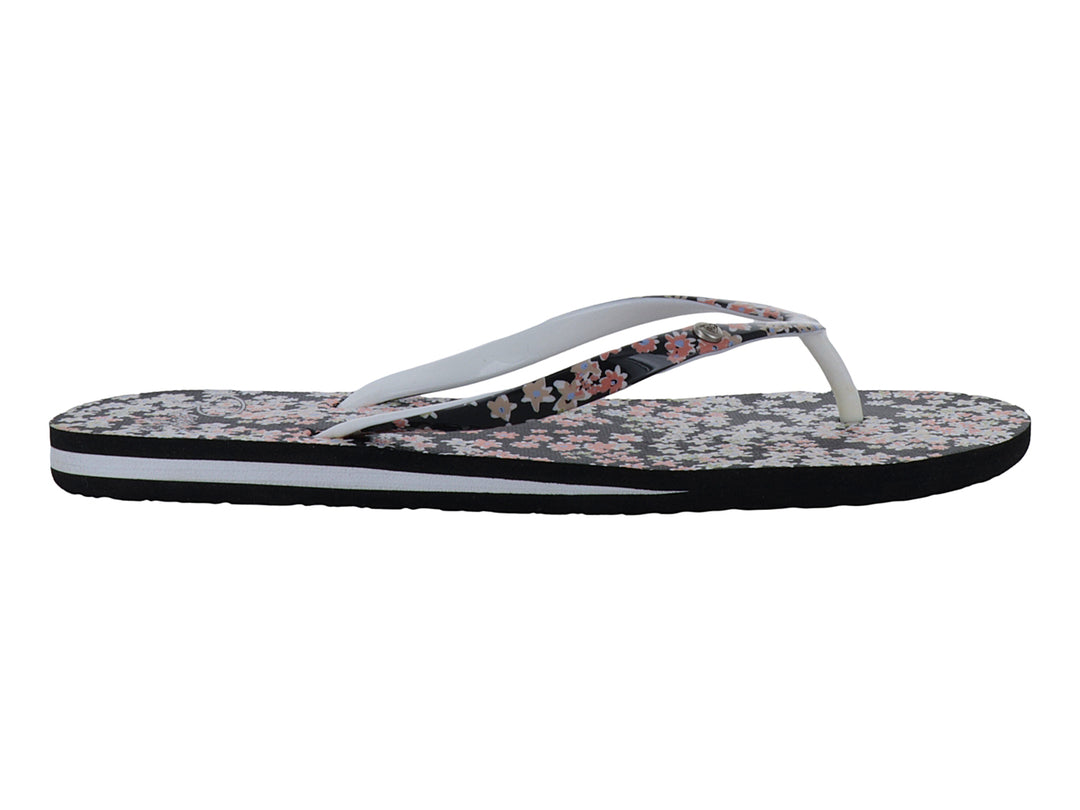 Sandalias Roxy negras con estampado floral rosa y blanco y suela blanca.