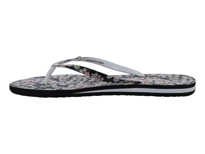 Sandalias Roxy negras con estampado floral rosa y blanco y suela blanca.