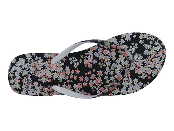Sandalias Roxy negras con estampado floral rosa y blanco y suela blanca.