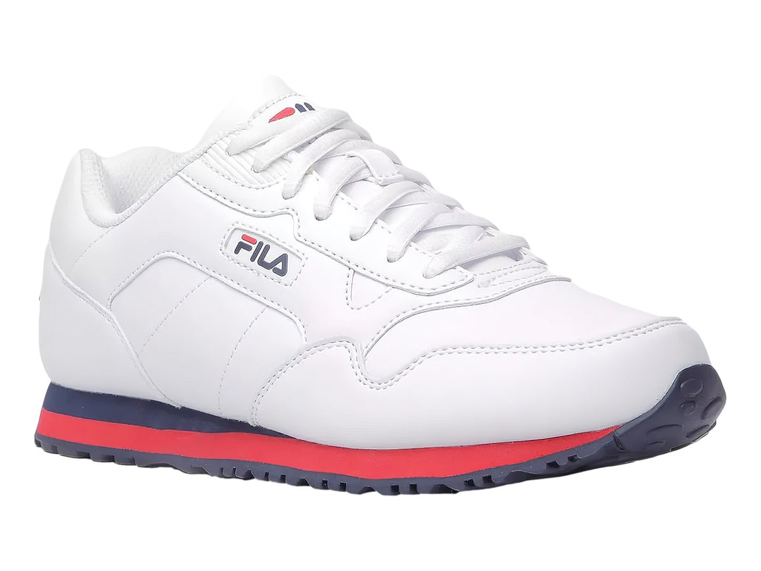 Tenis FILA blancos con suela en colores rojo y azul marino, vista lateral.