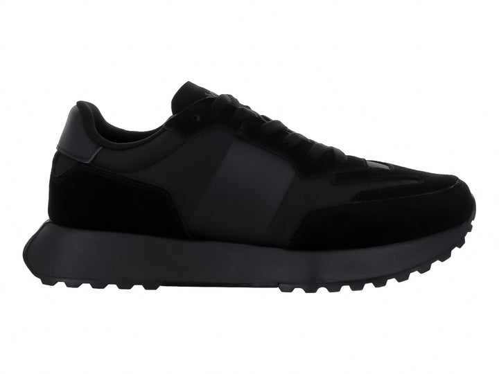 Tenis Calvin Klein color negro, modelo low top con agujetas y suela dentada.