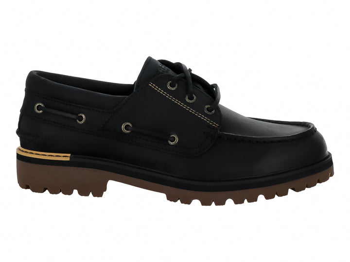 Zapato náutico Sperry de cuero negro con suela track marrón y costuras contrastantes.
