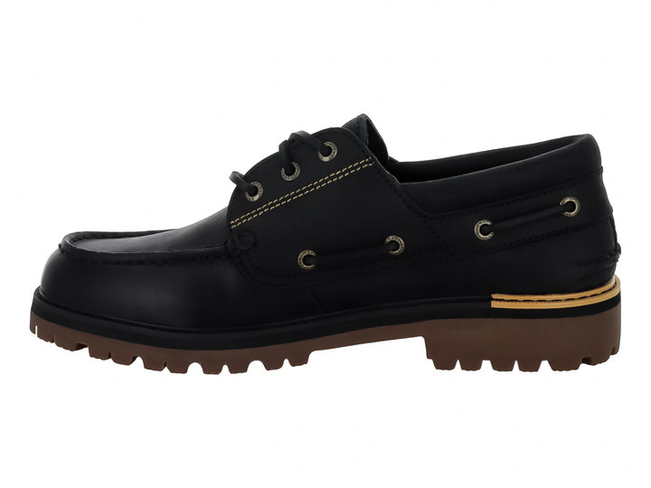 Zapato náutico Sperry de cuero negro con suela track marrón y costuras contrastantes.