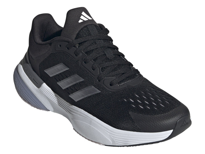 Tenis deportivos Adidas Response Super 3.0 en color negro con suela blanca y detalles en gris.