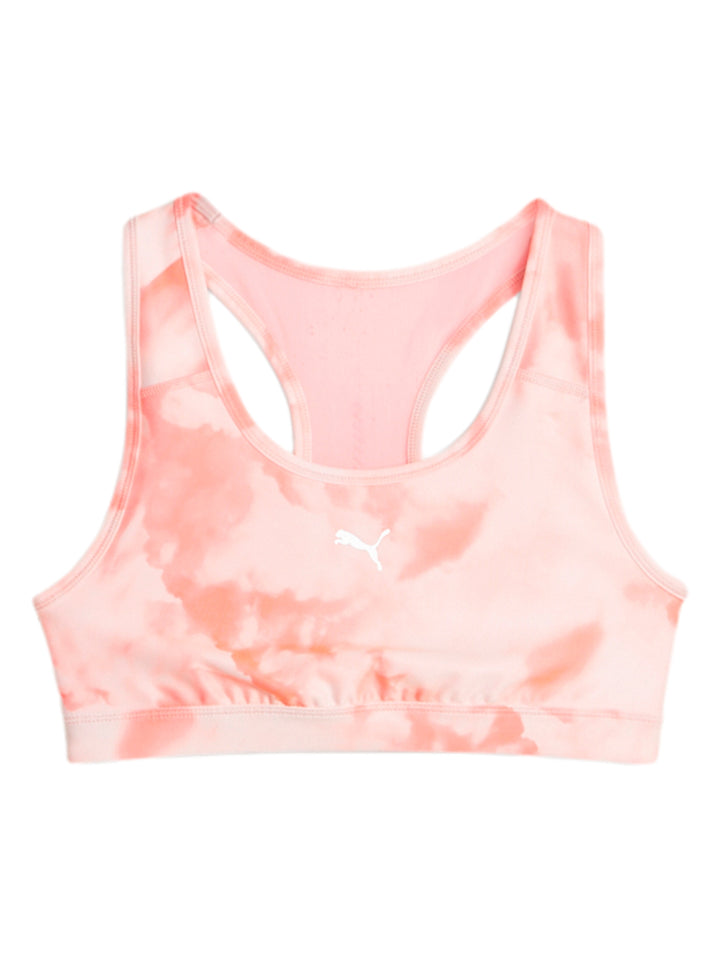 Bra deportivo PUMA color coral con estampado marmoleado y logo blanco al frente.