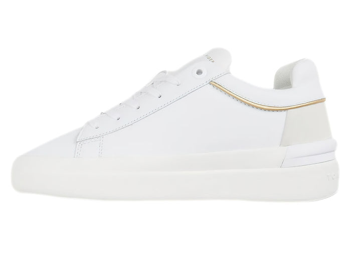 Tenis blancos Tommy Hilfiger de corte bajo con franja lateral tricolor y detalle beige en el talón.
