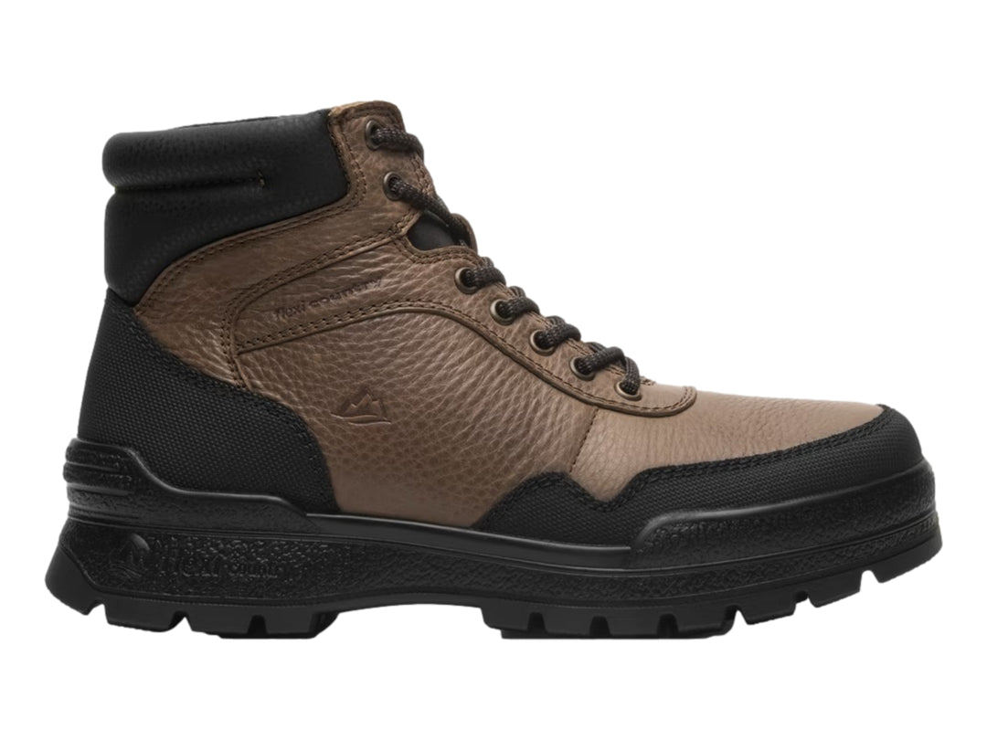Botín Flexi color taupe y negro con suela robusta y cierre de cordones para hombre.