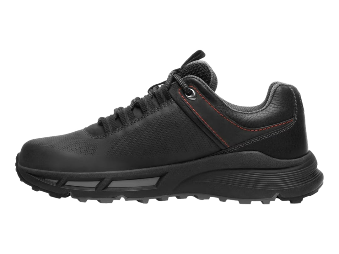 Zapato casual negro Flexi con suela gruesa y detalles de costuras rojas.