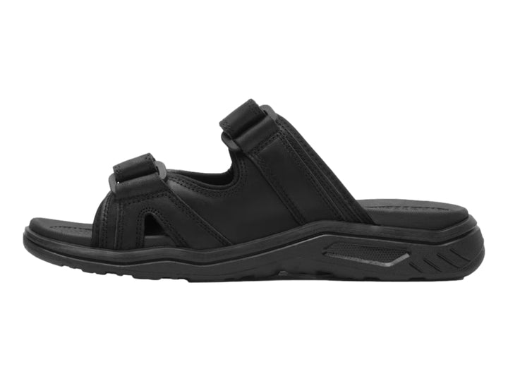 Sandalia Flexi color negro con correas ajustables y suela gruesa.