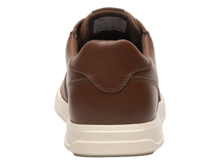 Zapato casual Flexi de cuero color marrón con suela blanca y cordones.