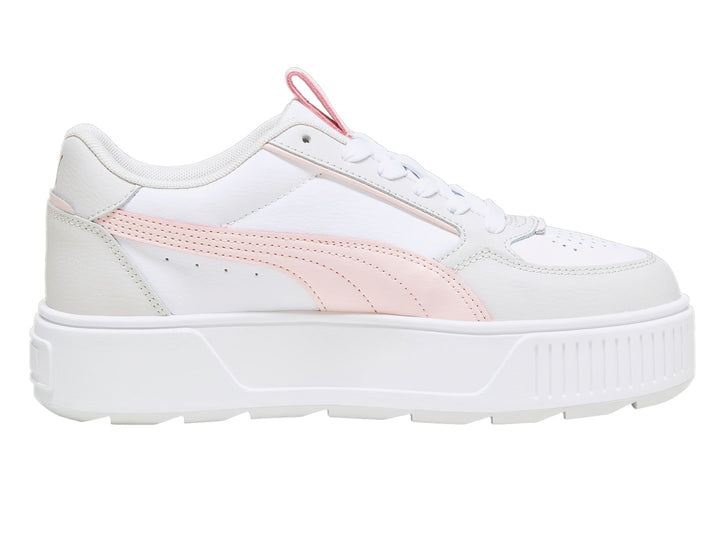 Tenis PUMA blancos con detalles en rosa y gris y suela de plataforma blanca.