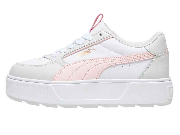 Tenis PUMA blancos con detalles en rosa y gris y suela de plataforma blanca.