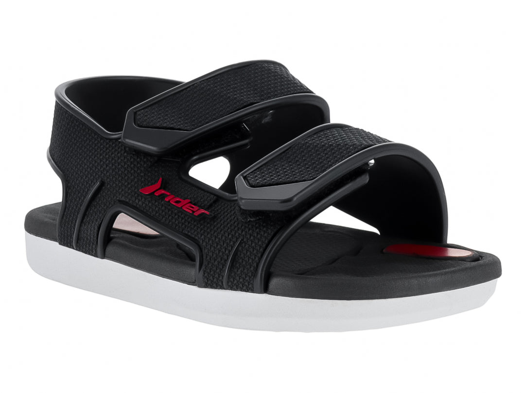 Sandalia infantil Rider color negro con suela blanca y correas ajustables de velcro.