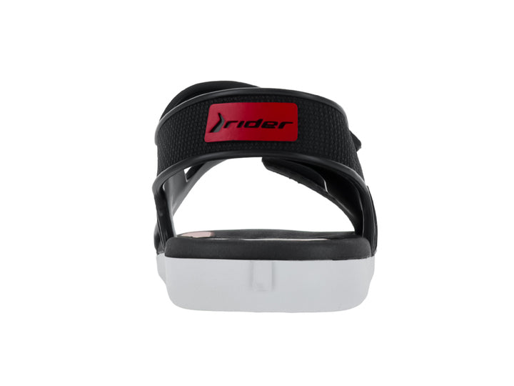 Sandalia infantil Rider color negro con suela blanca y correas ajustables de velcro.