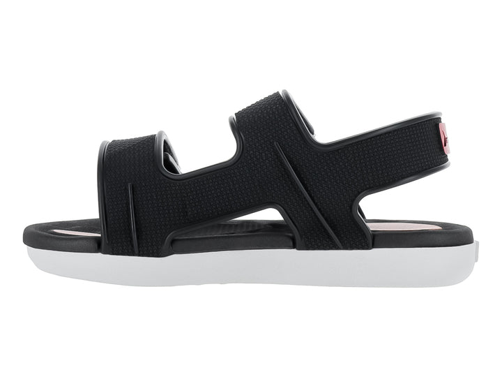 Sandalia infantil Rider color negro con suela blanca y correas ajustables de velcro.