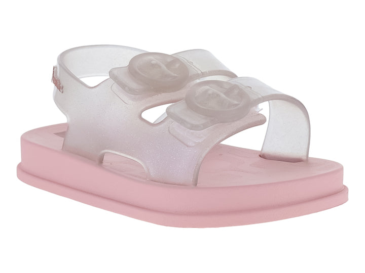Sandalias rosa con correas transparentes con glitter y hebillas.