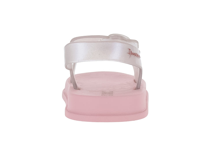 Sandalias rosa con correas transparentes con glitter y hebillas.