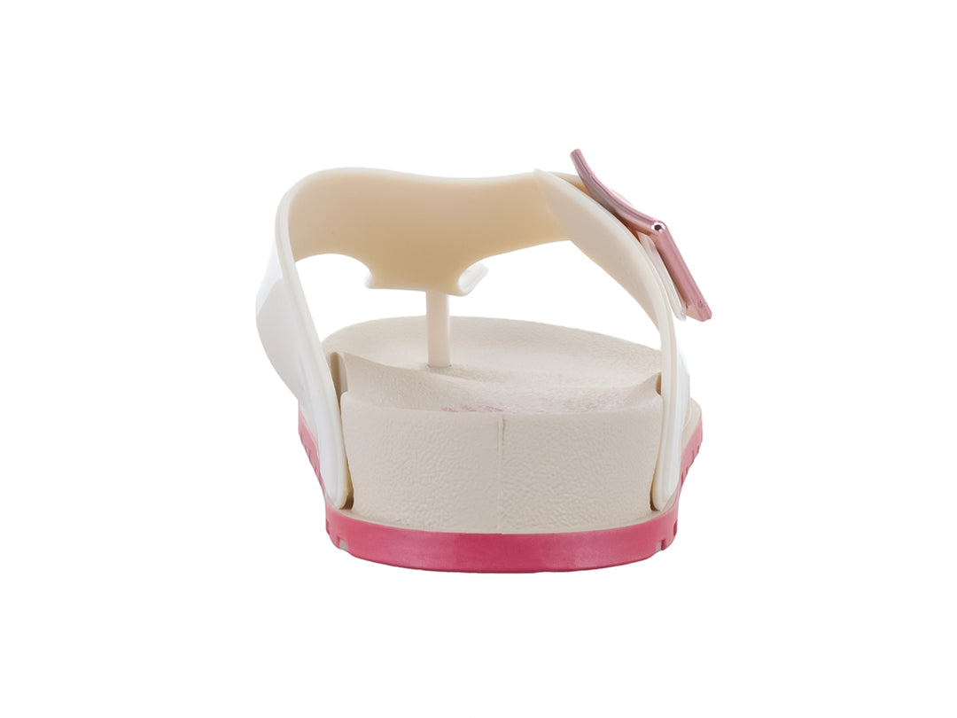 Sandalia Ipanema de dedo en color beige con suela y hebilla en tono rosa.