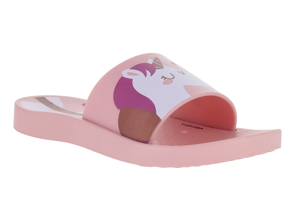Sandalia slide de color rosa con un diseño gráfico estampado en la banda superior.