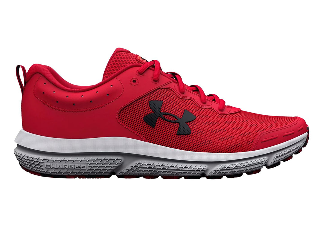 Tenis deportivos Under Armour color rojo con suela blanca y logotipo negro.