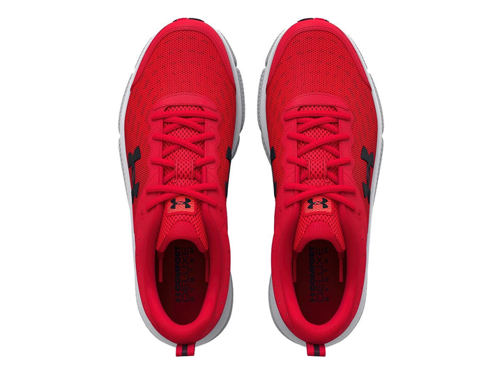 Tenis deportivos Under Armour color rojo con suela blanca y logotipo negro.