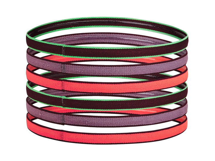 Set de 6 bandas para la cabeza Under Armour en colores morado, rojo y verde.