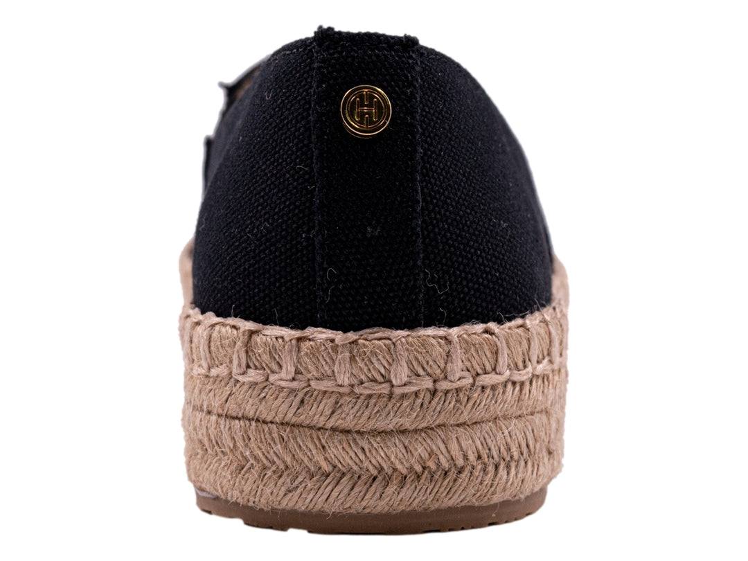 Zapato tipo alpargata color negro con suela de cuerda beige natural para mujer.