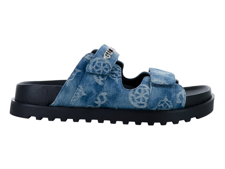 Sandalias GUESS color azul denim con suela gruesa negra y correa ajustable.