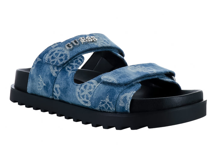 Sandalias GUESS color azul denim con suela gruesa negra y correa ajustable.