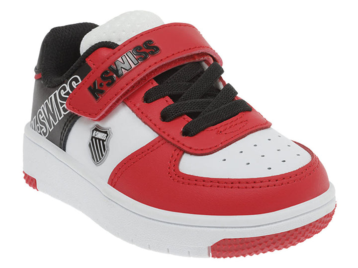 Tenis infantiles K-Swiss en colores blanco, rojo y negro con cierre de velcro y suela blanca.