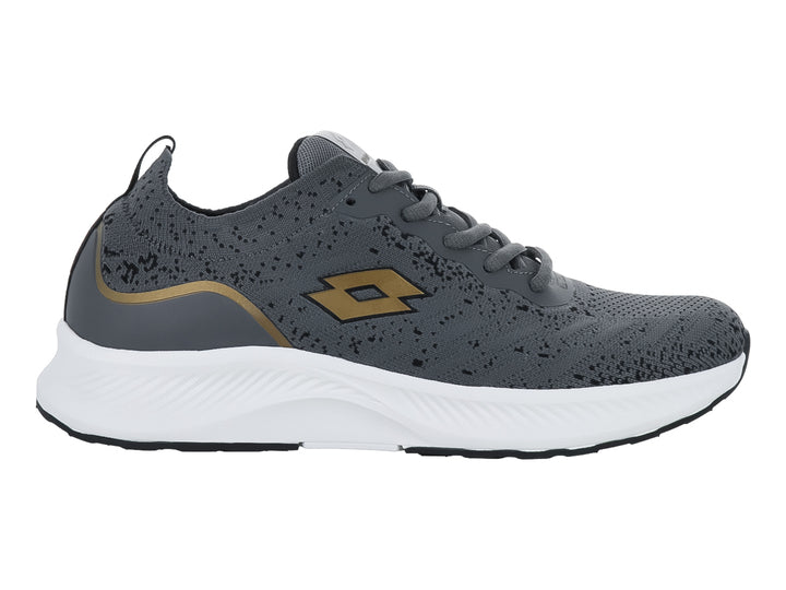 Tenis deportivos Lotto color gris oscuro con detalles dorados y suela blanca.