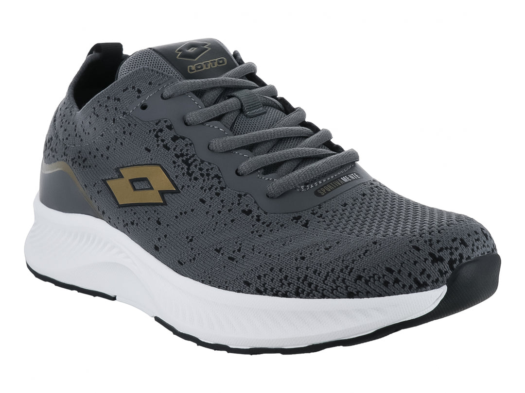 Tenis deportivos Lotto color gris oscuro con detalles dorados y suela blanca.