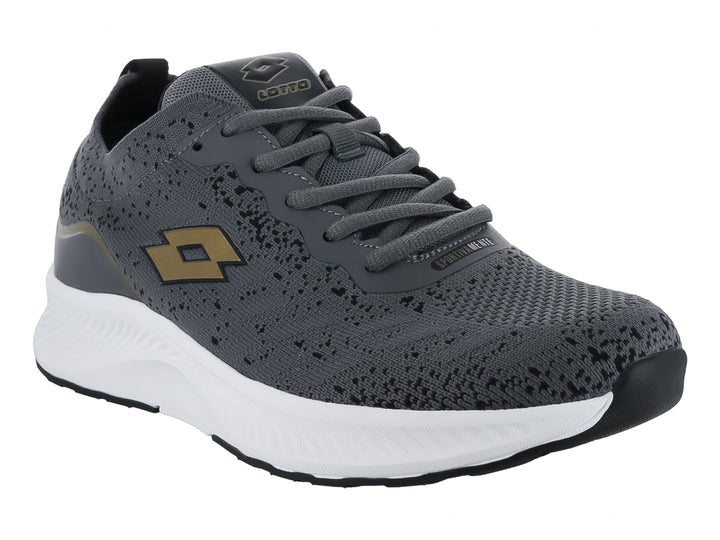 Tenis deportivos Lotto color gris oscuro con detalles dorados y suela blanca.