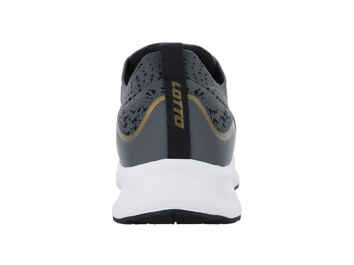 Tenis deportivos Lotto color gris oscuro con detalles dorados y suela blanca.