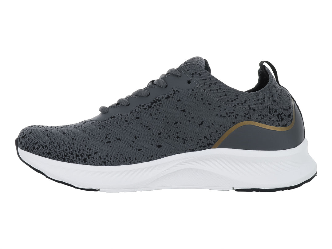 Tenis deportivos Lotto color gris oscuro con detalles dorados y suela blanca.