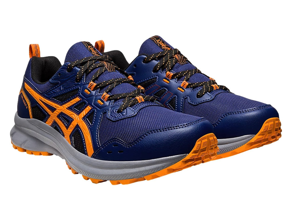 Tenis ASICS Trail Scout 3 color azul marino con detalles en naranja y suela gris.