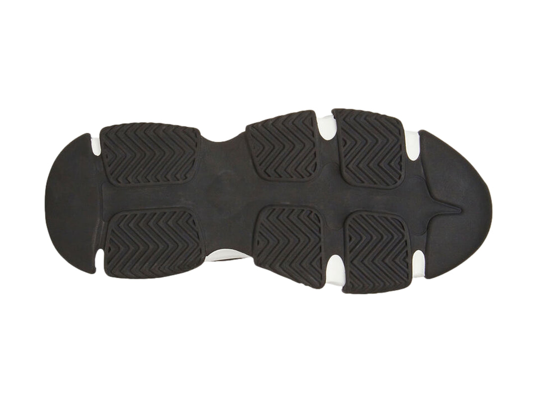 Tenis Steve Madden modelo Peters On en color negro con suela blanca gruesa y diseño tipo calcetín.