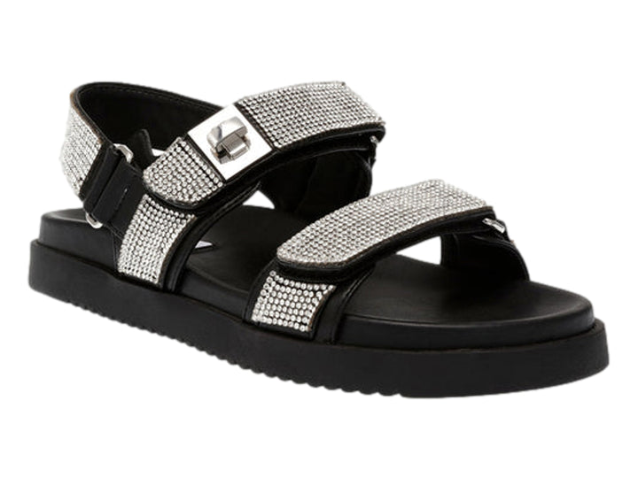 Sandalia Steve Madden color negro con correas decoradas en cristales plateados y suela de plataforma.