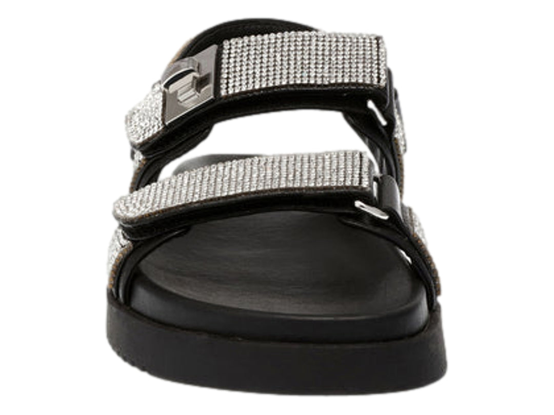 Sandalia Steve Madden color negro con correas decoradas en cristales plateados y suela de plataforma.