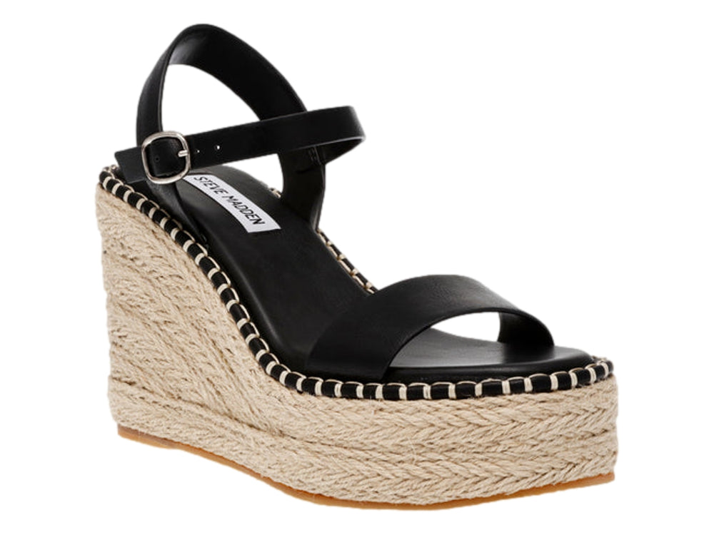 Sandalia de cuña color negro con plataforma de yute beige y correa con hebilla al tobillo.