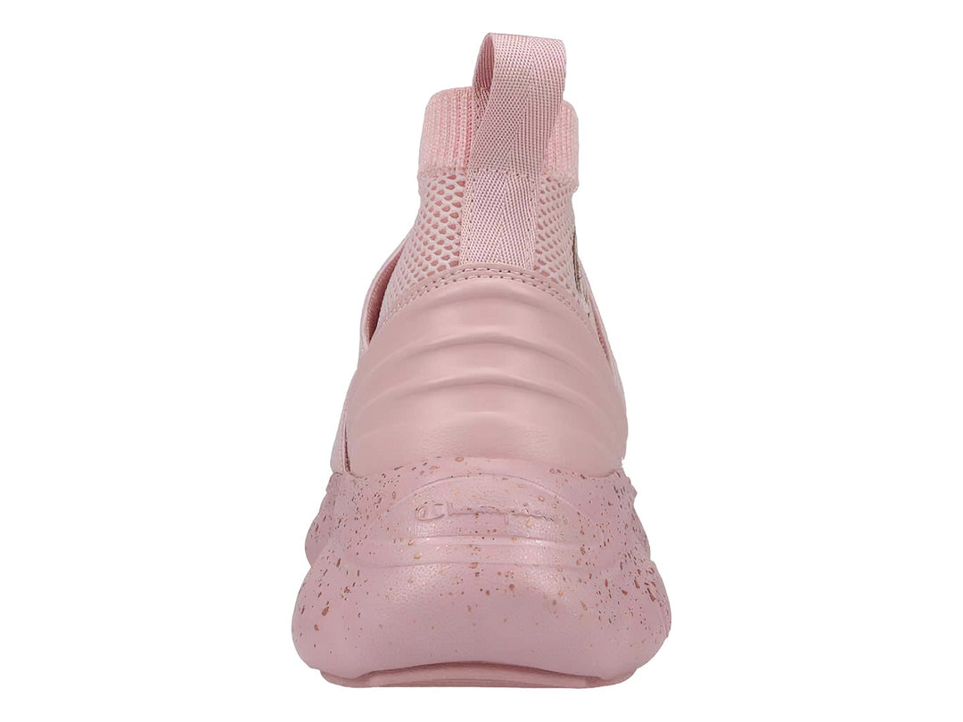 Tenis Champion color rosa pastel con diseño de bota, sin cordones y suela robusta moteada.
